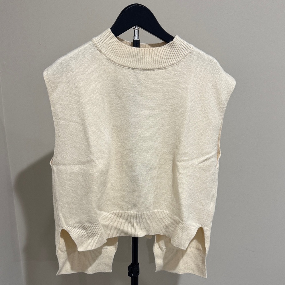 Cream Sleeveless Knit Sweater Vest with open back detail/bow
